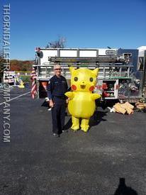 Deputy Chief Taylor and Pikachu. 